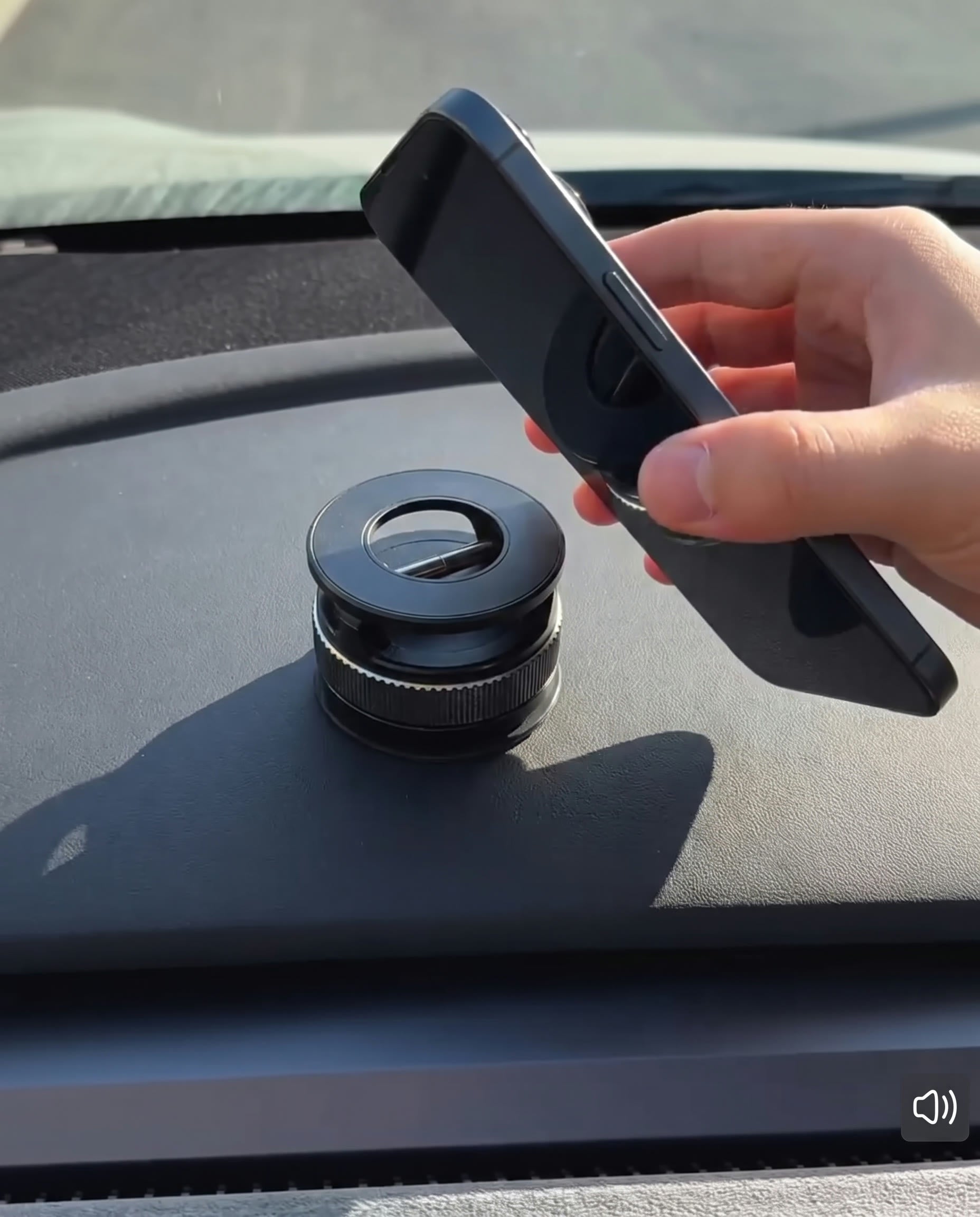 Phone snapping onto magnetic mount